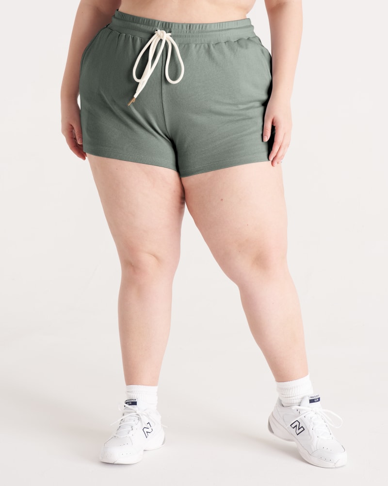 Front of a model wearing a size 1X The Jogger Short in Thyme by The Standard Stitch. | dia_product_style_image_id:288186